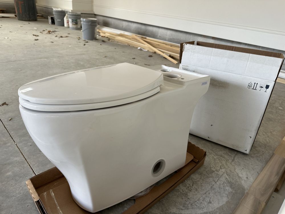 Skirted toilets installation by Pipe It Up Plumbing